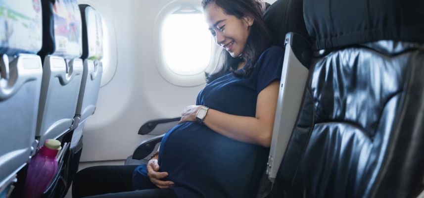 Guide to Flying While Pregnant mom flying pregnant